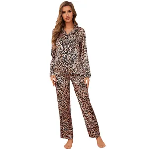 Stylish women's leopard print pajamas set featuring a long-sleeve top and trousers.
