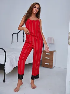 Red striped camisole pajama set with black lace trim pants details