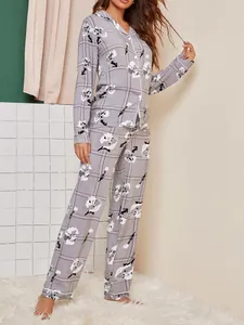 Floral plaid women's long sleeve pajama set with button-down shirt and matching trousers