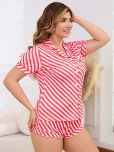 Comfortable women's summer pajama set with vibrant red and pink diagonal stripe pattern