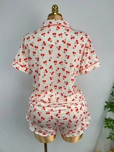 Back view of women's summer cherry print short-sleeved pajama set on mannequin