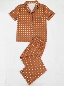 Detail view of brown polka dot pajama set with short sleeve top and long pants