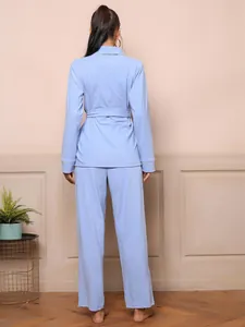Detailed back view of a soft light blue women's belted long-sleeve pajama and long pants set
