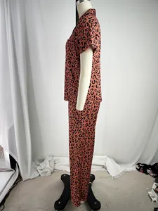Side profile view of women's leopard print pajama set featuring short sleeves and long pants.