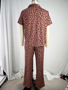 Back view of leopard print women's pajama set featuring short sleeves and long pants