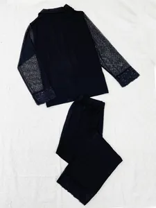 High-quality black modal pajama set featuring mesh sleeves and delicate lace trim details
