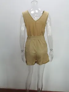 Detailed back view of a khaki sleeveless V-neck romper featuring a matching waist belt
