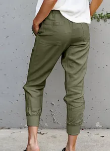 Detailed back view of women's olive green cotton linen cropped joggers with elastic cuffs