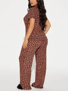 Side view of women's leopard print pajama set featuring short sleeves and long pants.