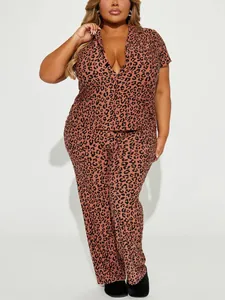 Detail view of women's leopard print pajama set with short sleeves and long pants