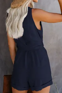 Back view of a casual navy blue sleeveless romper with tie-waist for summer