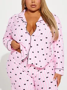 Detail view of women's heart print striped pajama set with notched lapel