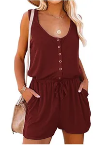 Close-up of a burgundy sleeveless romper with button detail and drawstring waist.