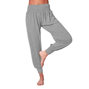 Comfortable gray harem yoga pants for women with smocked waist and elasticated cuffs