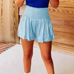 High waisted light blue metallic shorts with smocked elastic waistband for women