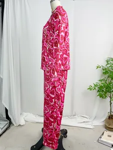 Professional side view of two-piece pink psychedelic floral print pajama set on mannequin