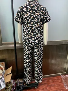 Back view of women's floral print short sleeve pajama top and long pants lounge set
