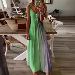 Vibrant sleeveless summer maxi dress featuring a stylish green and purple vertical gradient print