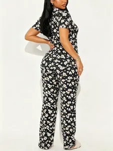 Back view of floral two-piece pajama set with short sleeves and long pants loungewear