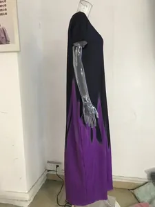 Side view of a summer loose maxi dress featuring purple gradient print and side pockets