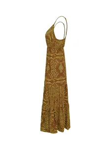 Detailed side profile view of bohemian paisley print tiered maxi dress with straps