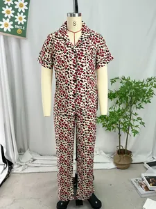 Two-piece women's pajama set featuring red leopard print top and matching long pants