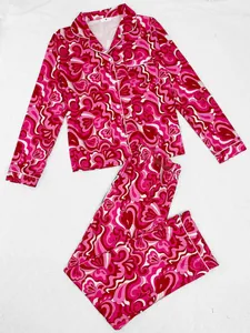 Vibrant psychedelic print pajama set for women featuring long sleeves and pants