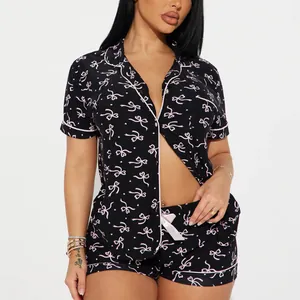 Pyjama deux pièces noir pour femme avec imprimé nœud rose et manches courtes élégant