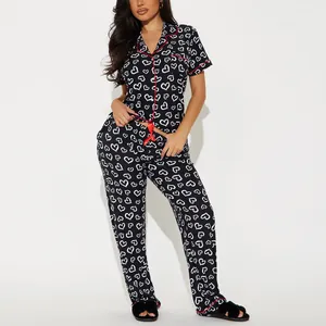 Stylish women's heart print two-piece pajama set with short sleeve shirt and pants