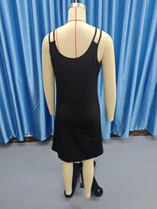 Detailed back view of a slim-fit black sleeveless spaghetti strap dress on a mannequin