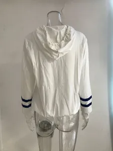 Back view of a white ribbed long-sleeve hoodie featuring double blue stripes on the cuffs.