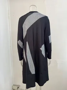 Back view of a loose casual plus size knit cardigan with abstract grey stripe prints