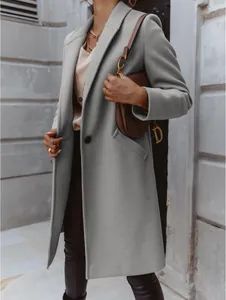 Elegant sage green mid-length wool coat for women with lapel collar and button detail.
