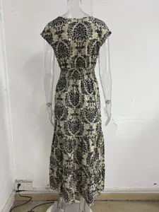 Rear view detail of vintage damask print maxi dress showing elasticated waistline