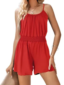 Detailed macro view of a red casual summer romper featuring a smocked waist design.