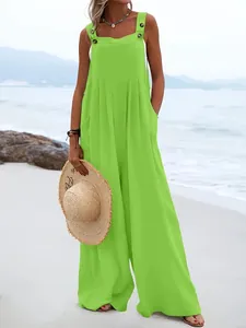 Vue détaillée d'une combinaison sans manches vert lime à jambes larges pour la plage
