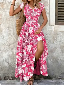 Detail view of a vintage pink floral maxi dress with elegant V-neckline and short sleeves.