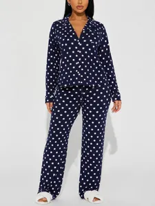 Navy blue long-sleeved pajama set for women featuring white star print and lapel