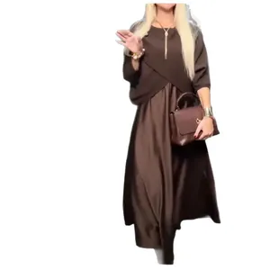 Elegant brown crew neck midi dress with half sleeves and a layered wrap top design.
