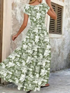 Back view of retro green floral print maxi dress with short sleeves and elegant fit.