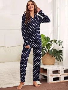 Cozy navy blue two-piece pajama set for women with classic white star print pattern