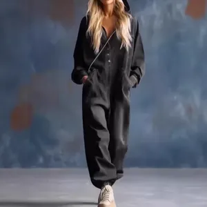 Stylish casual black denim long-sleeved jumpsuit featuring large side pockets and buttons