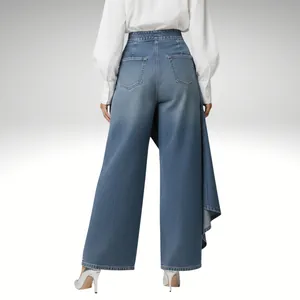 Rear view of stylish high-waisted wide-leg denim pants featuring unique side drape design