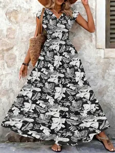 Close-up of elegant vintage tropical leaf print on V-neck short sleeve maxi dress