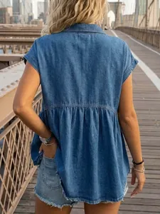Back view of a fashionable casual short-sleeve denim peplum top for women outdoors.
