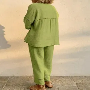 Rear view of a comfortable lime green loose-fitting two-piece linen-style casual suit.