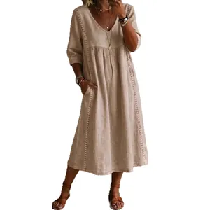 Abito midi casual da donna con scollo a V, maniche medie e dettaglio in pizzo traforato.