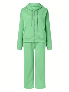 Comfortable mint green two-piece women's hooded tracksuit set with zip-up hoodie and pants