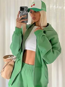 Green oversized hooded zip-up sweatshirt and matching sweatpants two-piece set