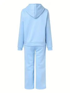 Detailed back view of women's light blue solid color hooded tracksuit two-piece set
